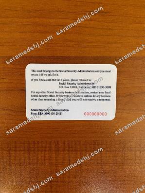 USA SSN photolook dark wood table background BACK